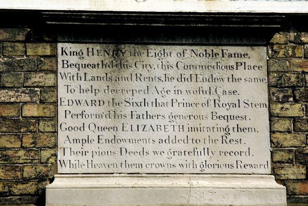 Photograph of the tablet which appears over the south entrance to the hospital. Photographer: C. Bonfield